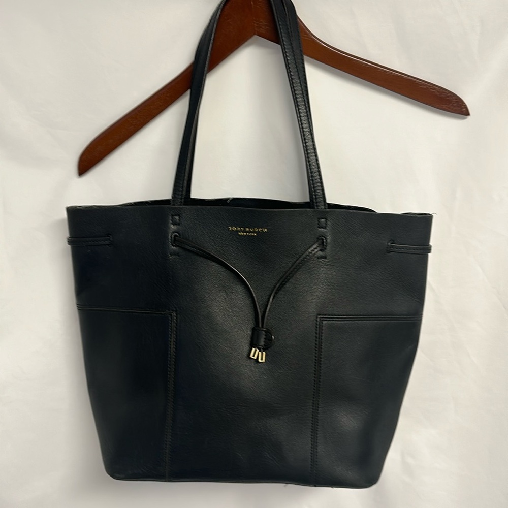 Tory Burch Leather Black Tote with Draw String one pocket onside phone size